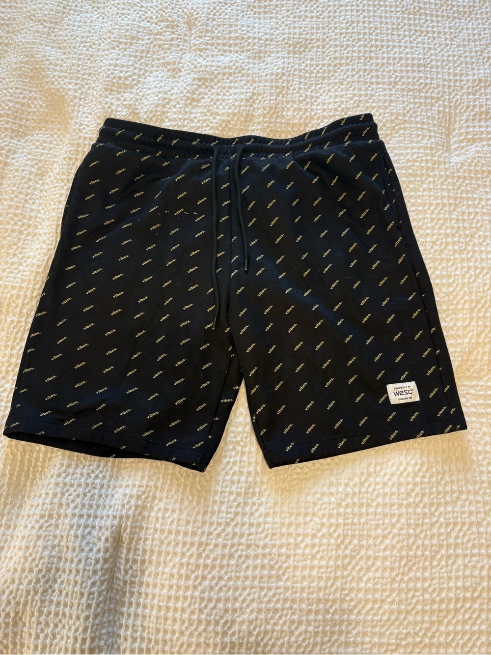 Wesc Black Shorts with Small Yellow Logo Print